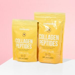 Bright product shot of collagen peptide supplements with pink background.